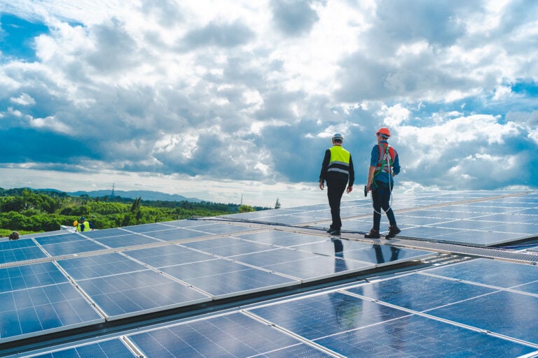 Technician engineers checking solar